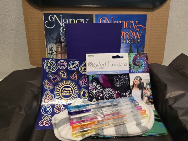 Contents of ICANCERVIVE healing kits including art supplies, comfort items, journaling materials, and tactile therapy components for pediatric, young adult, and adult cancer patients